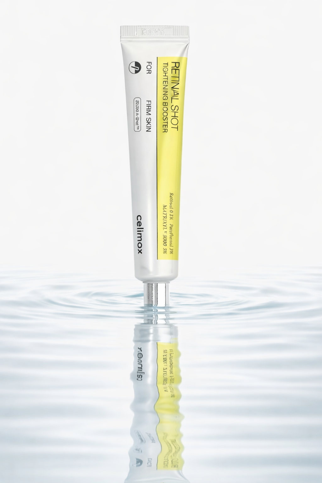 celimax THE -A Retinal Shot Tightening Booster 15ml in a reflective water surface showcasing its packaging.